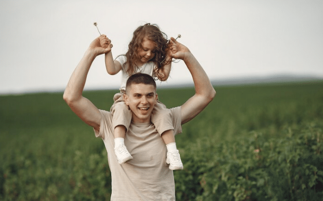 a father playing with his child